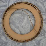 Round gilded wooden frame