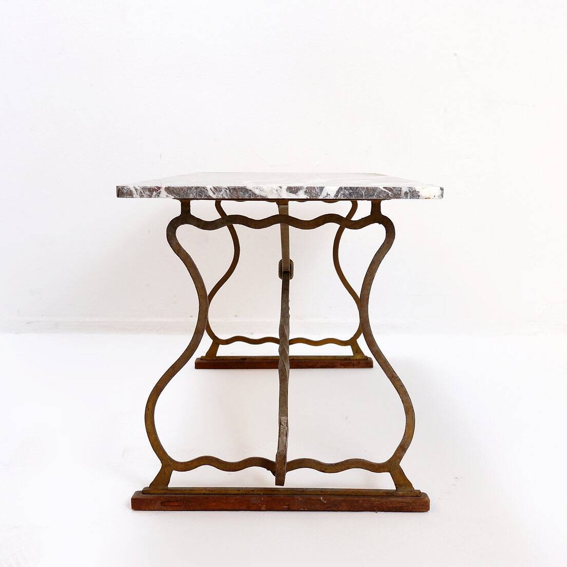 Wrought iron and marble coffee table