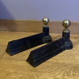 Pair of Napoleon III andirons from the 19th century in cast iron and brass