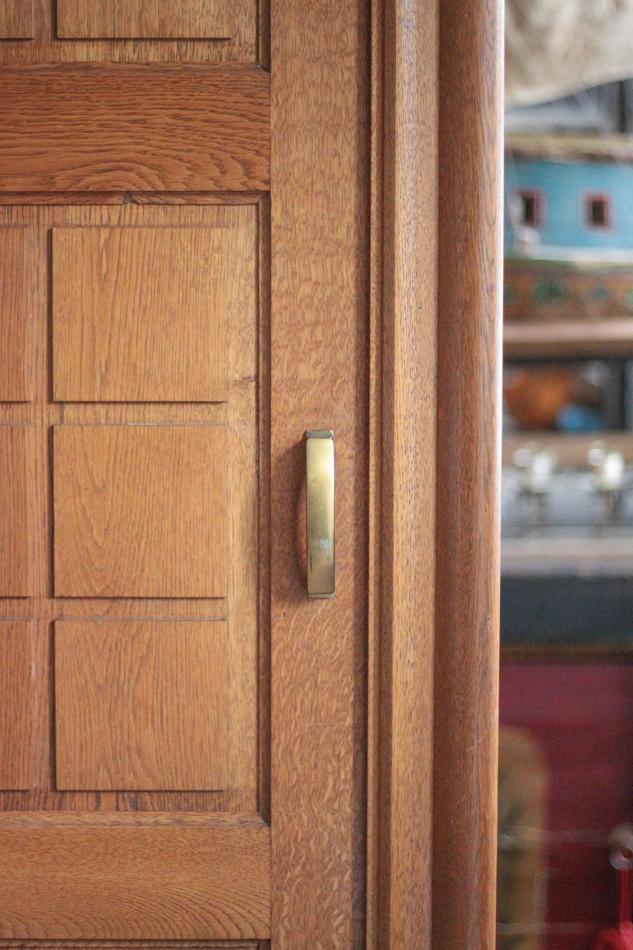 Vintage wooden wardrobe with sliding doors.
