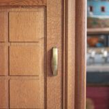 Vintage wooden wardrobe with sliding doors.