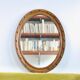 Antique oval mirror in carved wood