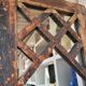 Wooden mirror mounted on old door