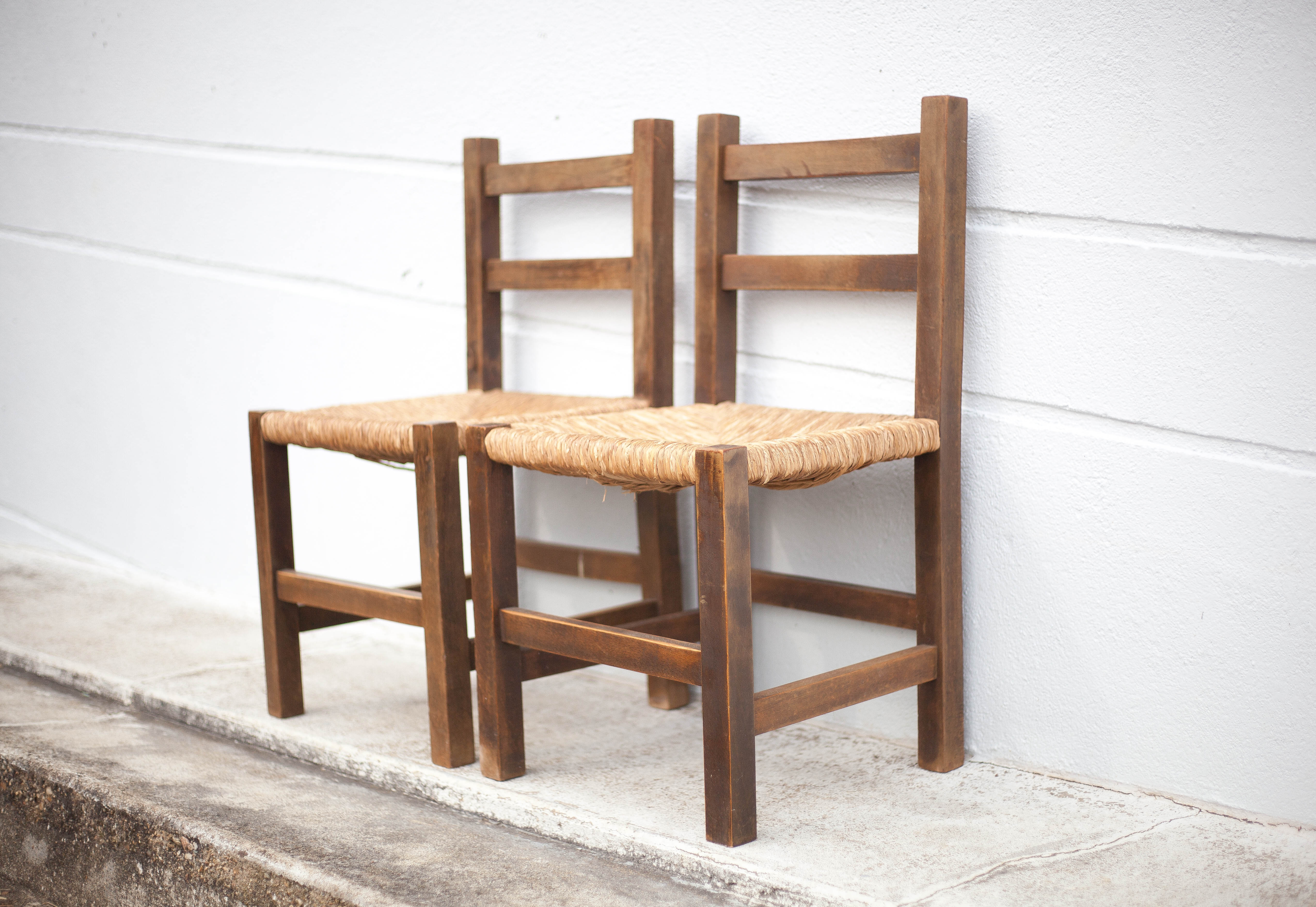 Pair of wooden and straw chairs