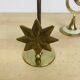 Pair of mother-of-pearl brass candlesticks with moon and sun