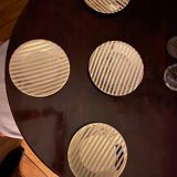 Suite of 4 golden plates