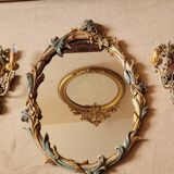 Mirror and its carved wooden sconces