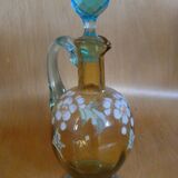 Enamelled liqueur decanter with floral decoration