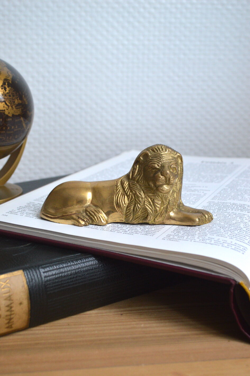 Brass lion paperweight