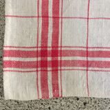 4 red mixed-race tea towels