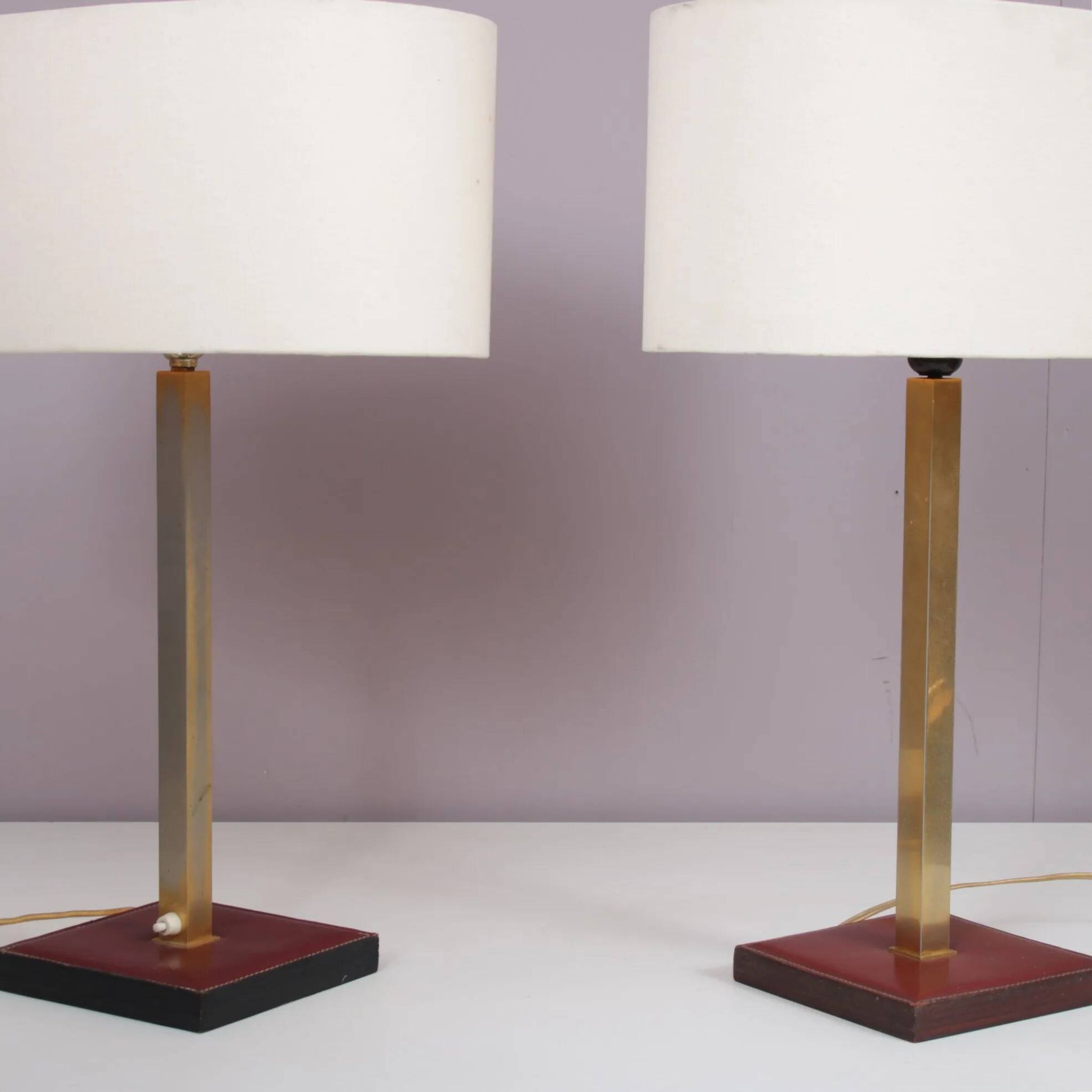Pair of leather and brass table lamps from the 1960s, originating from Belgium.