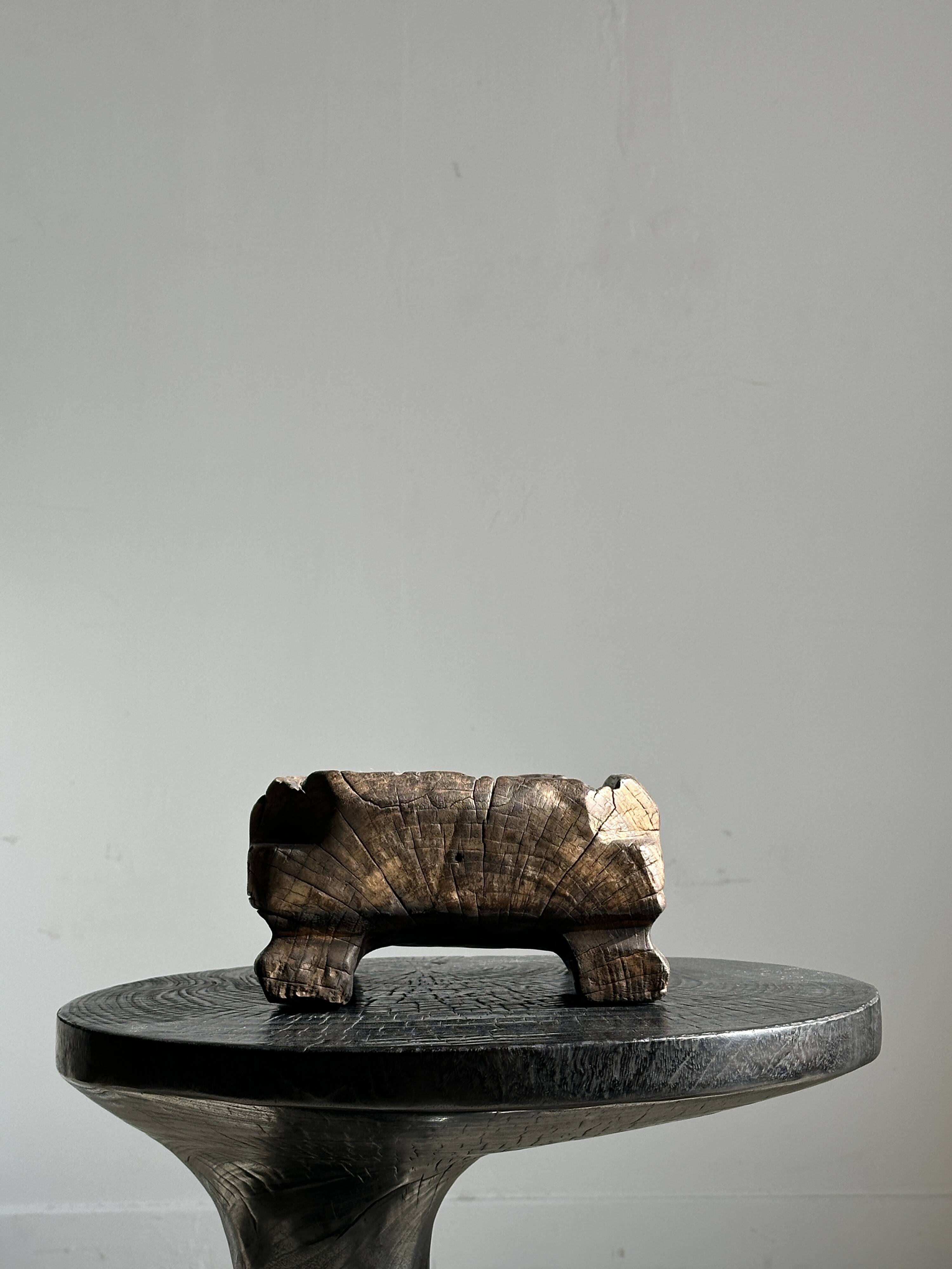 Solid wood (monoxyl) side table, organic shape, black color