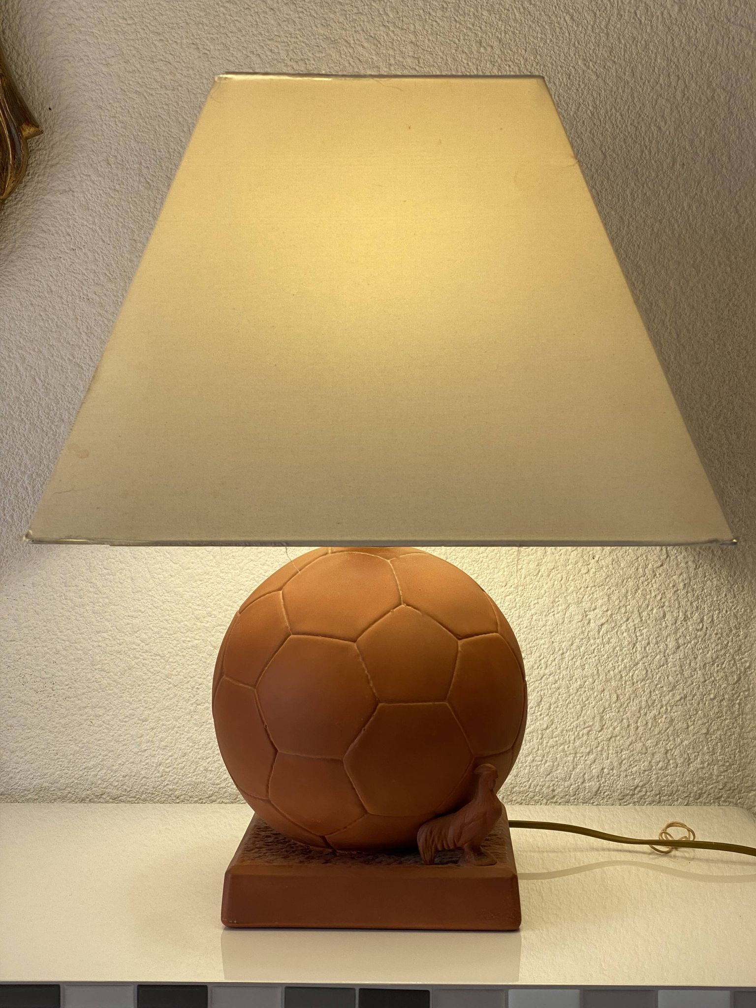 Football lamp and terracotta rooster from the 80s