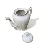 Porcelain coffee pot with floral pattern and silver stem