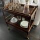 Wooden and brass rolling trolley