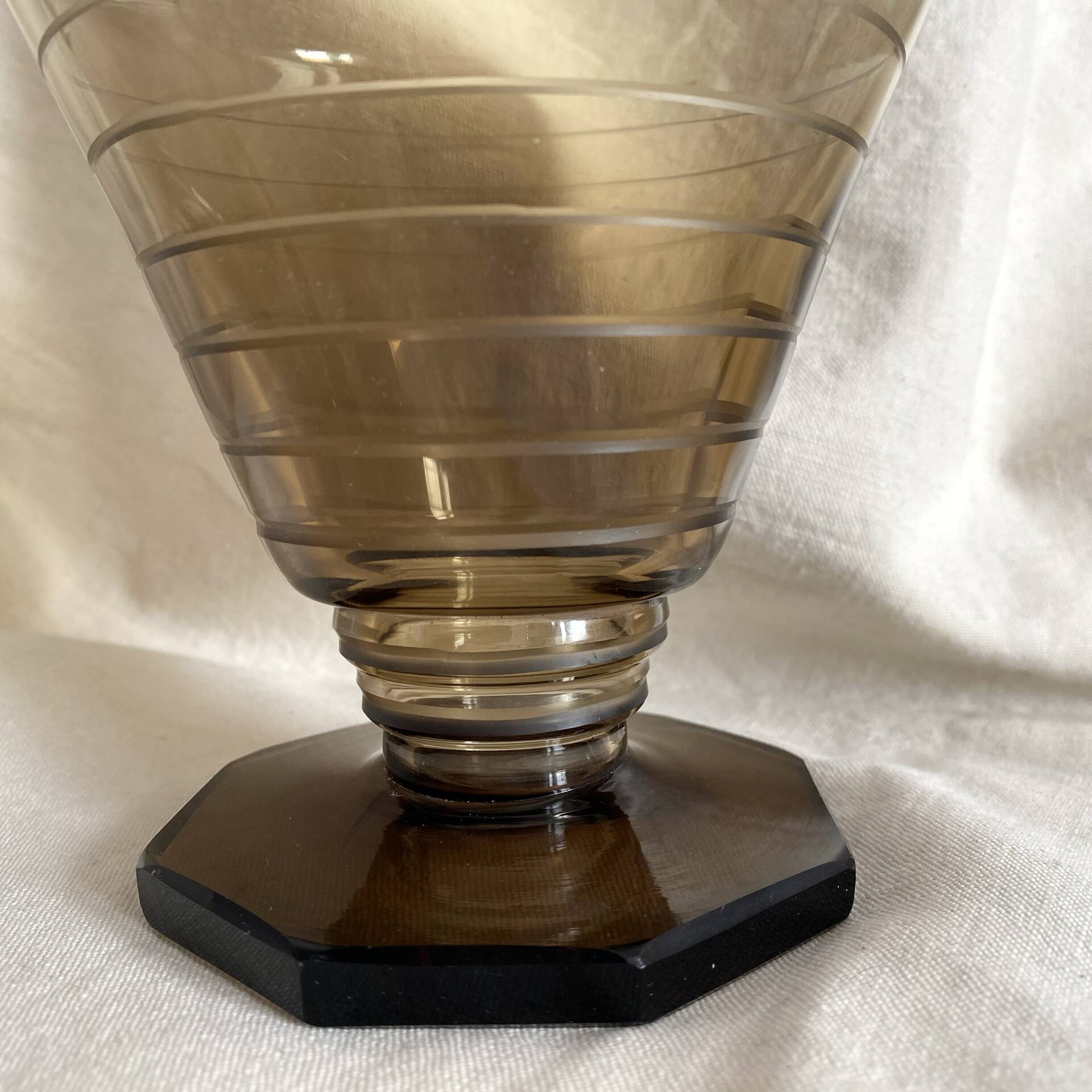 Art Deco smoked glass carafe with fan-shaped stopper.
