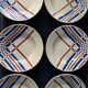 6 assiettes creuses aux couleurs basques, KG Lunéville, 1930