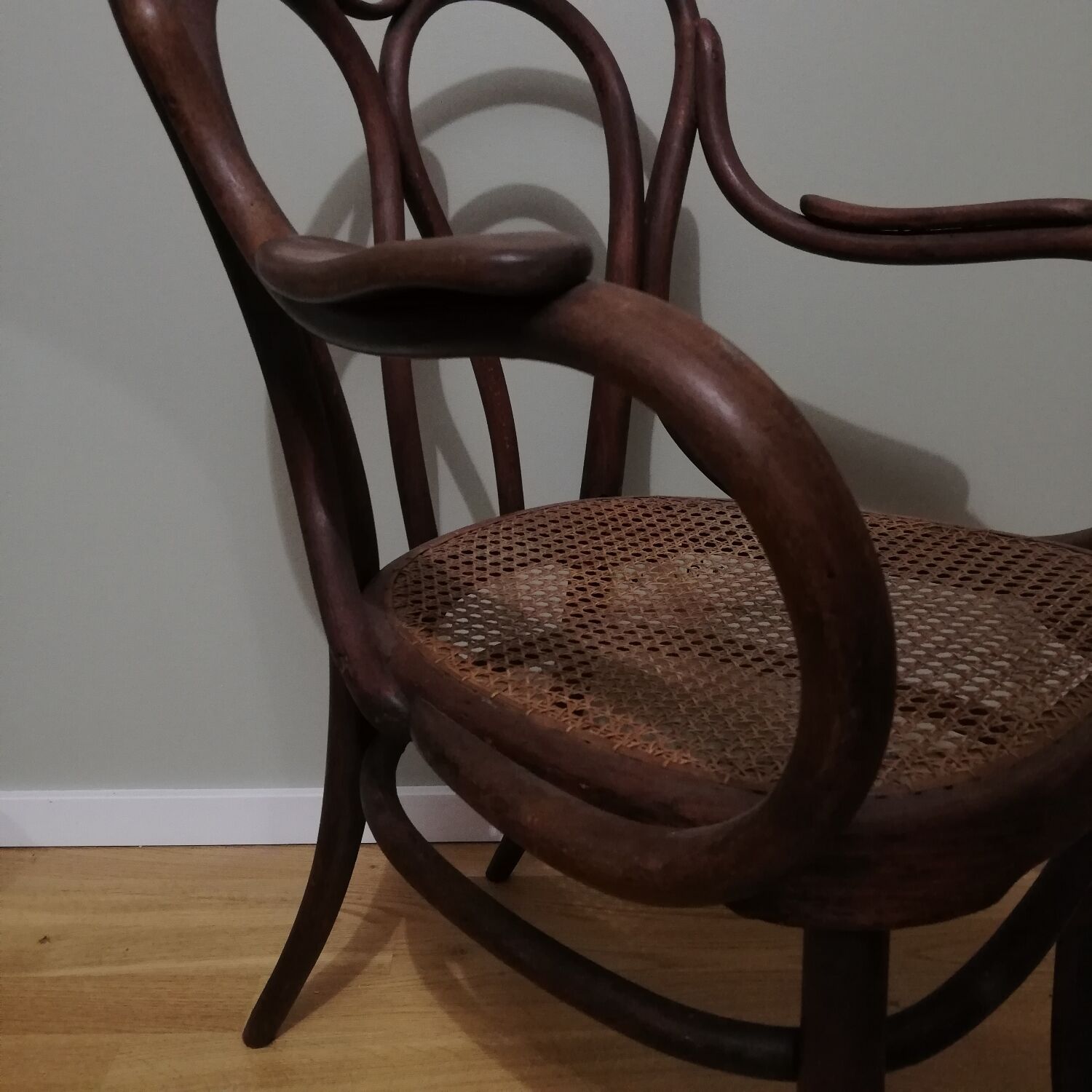 Canned armchair in curved wood signed J.Kohn