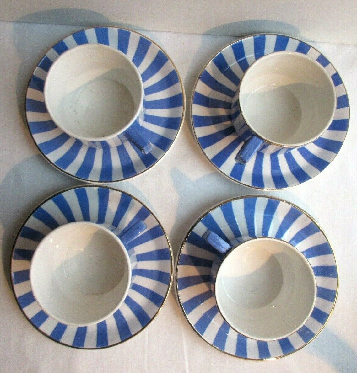 4 coffee cups - 4 saucers signed Sarreguemines model FOX TROTT