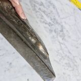 Bas-relief plaque of a rabbit in brown patina, seated cat