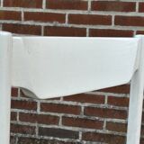 Vintage chair with wicker seat, minimalist design