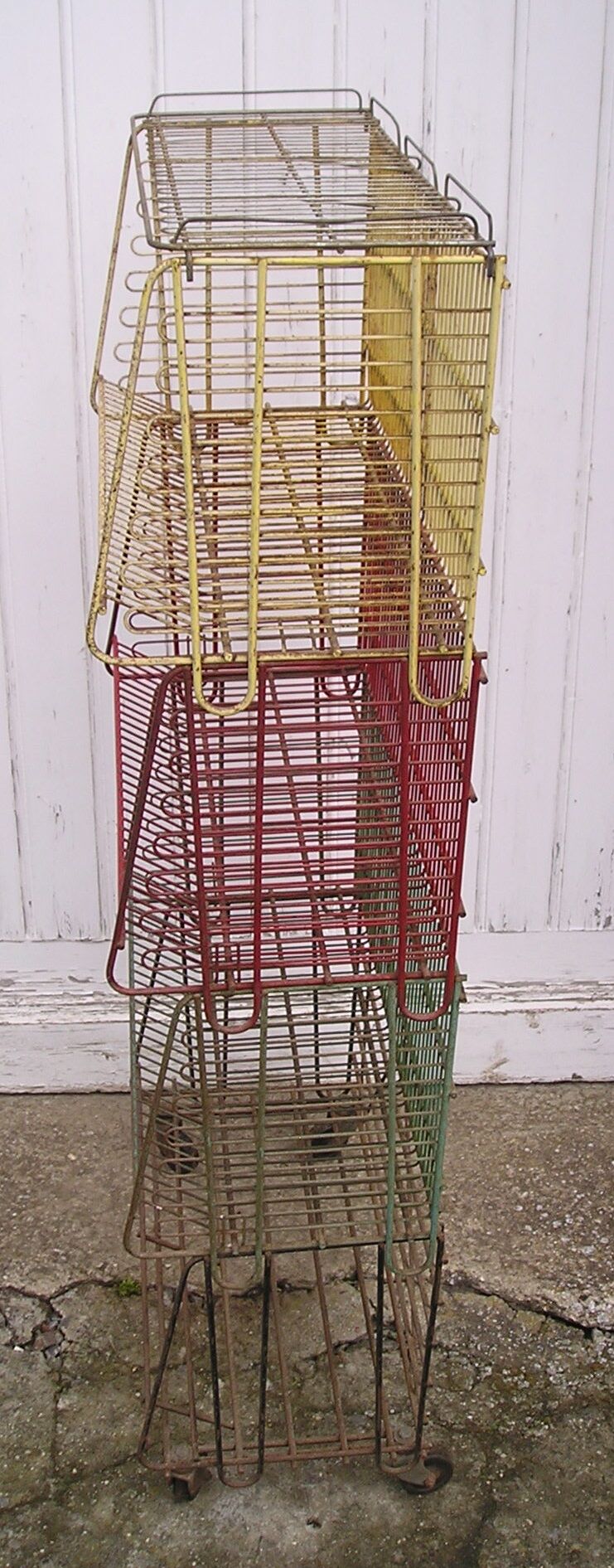 Metal display on wheels with 4 removable baskets 1960/70
