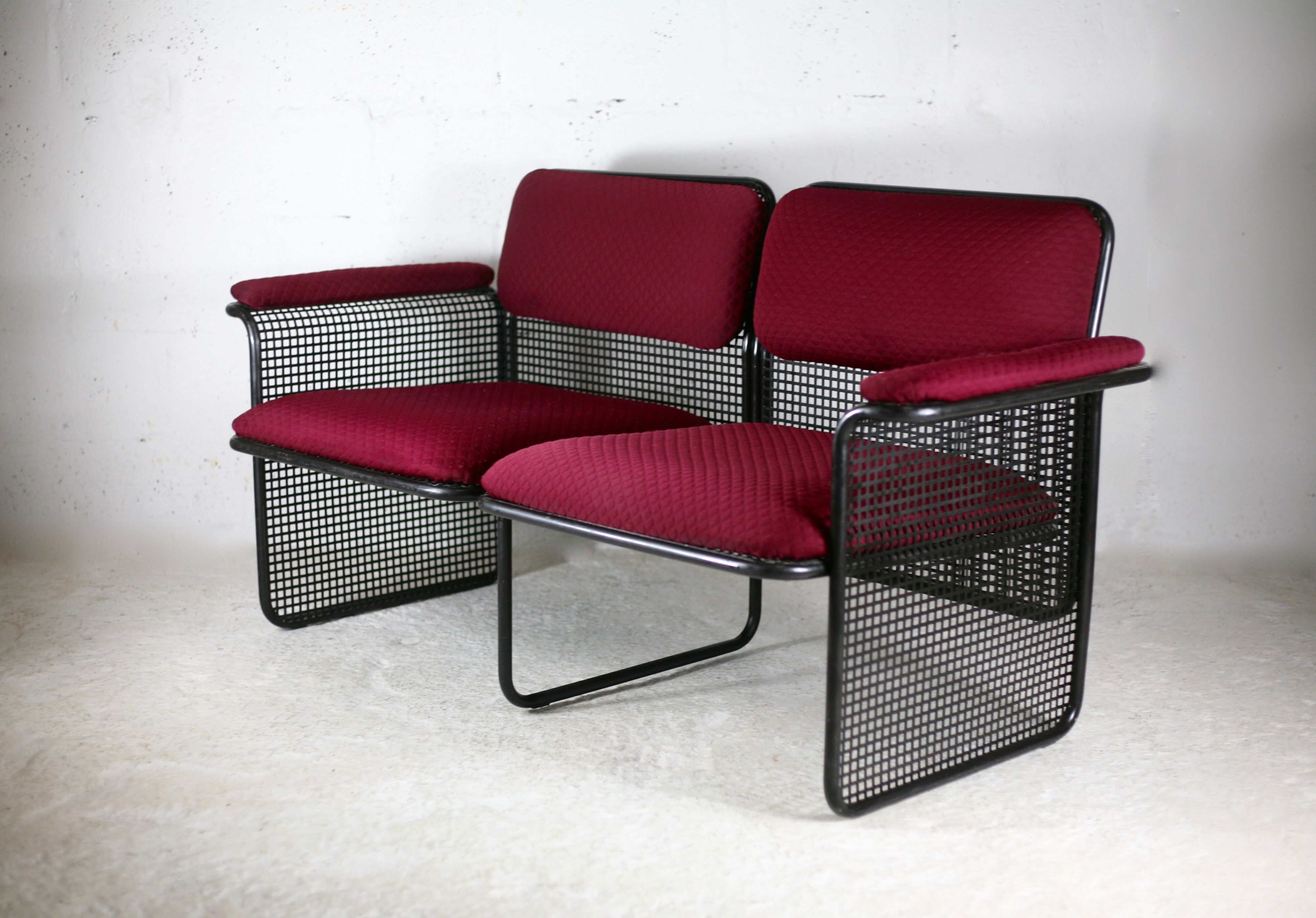 Black honeycomb steel sofa, burgundy fabrics, Italy, circa 1970