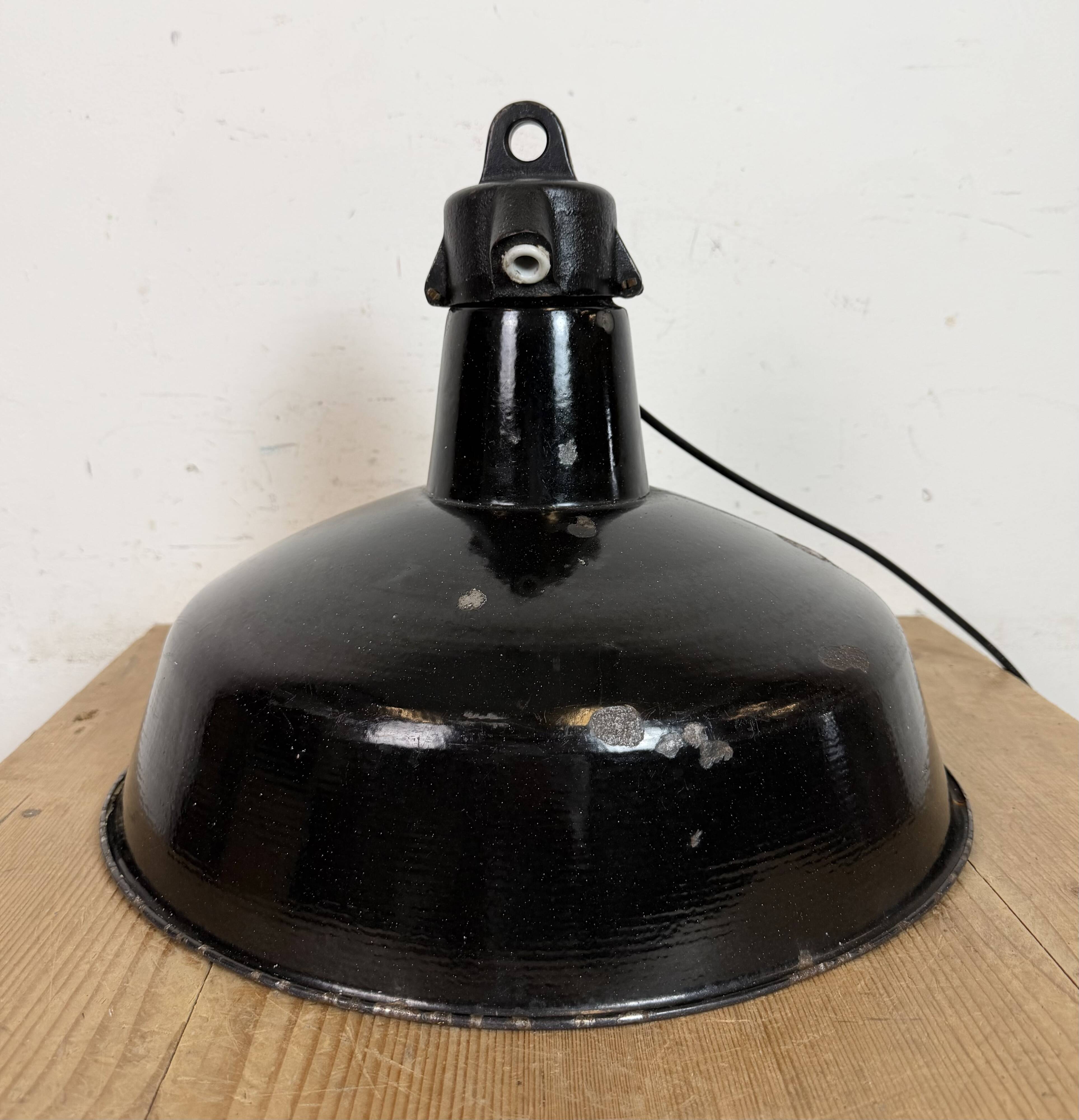 Industrial Black Enamel Factory Lamp with Cast Iron Top, 1950s
