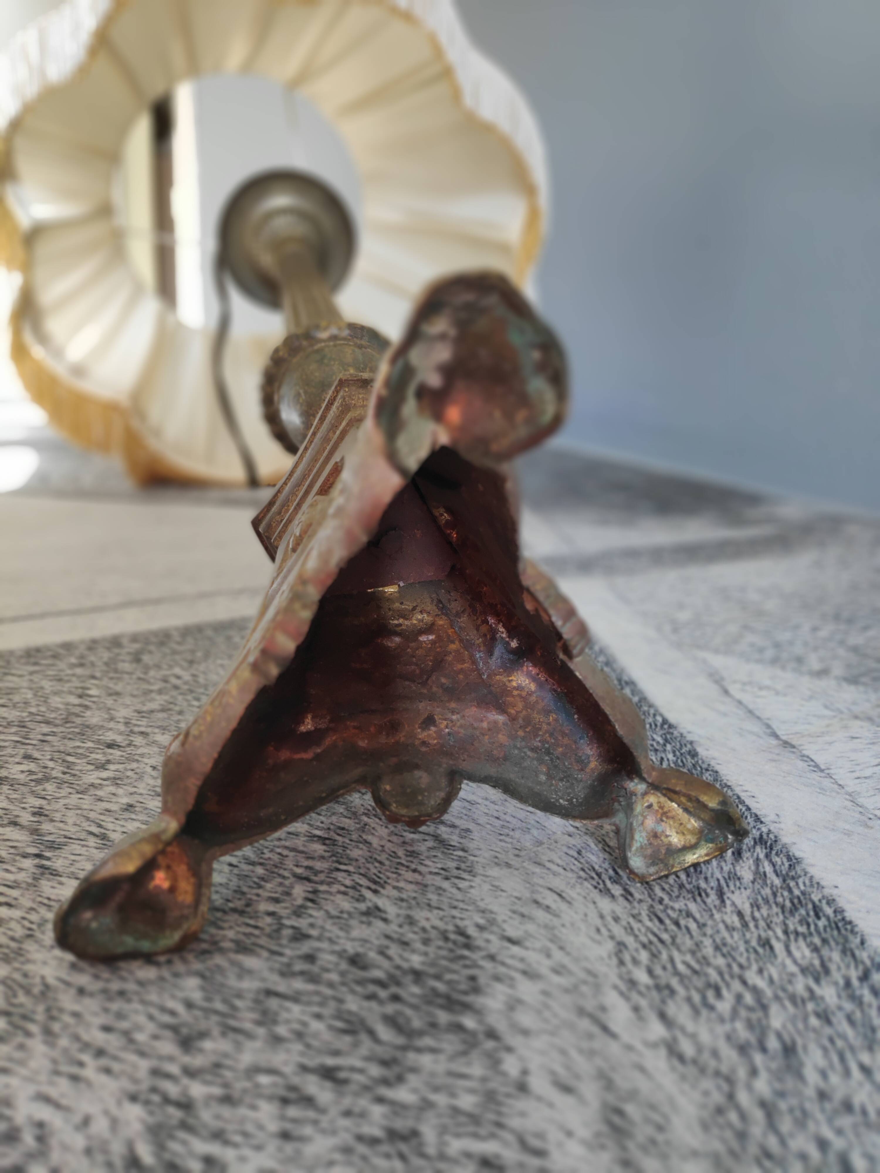 Old brass foot lamp and period lampshade
