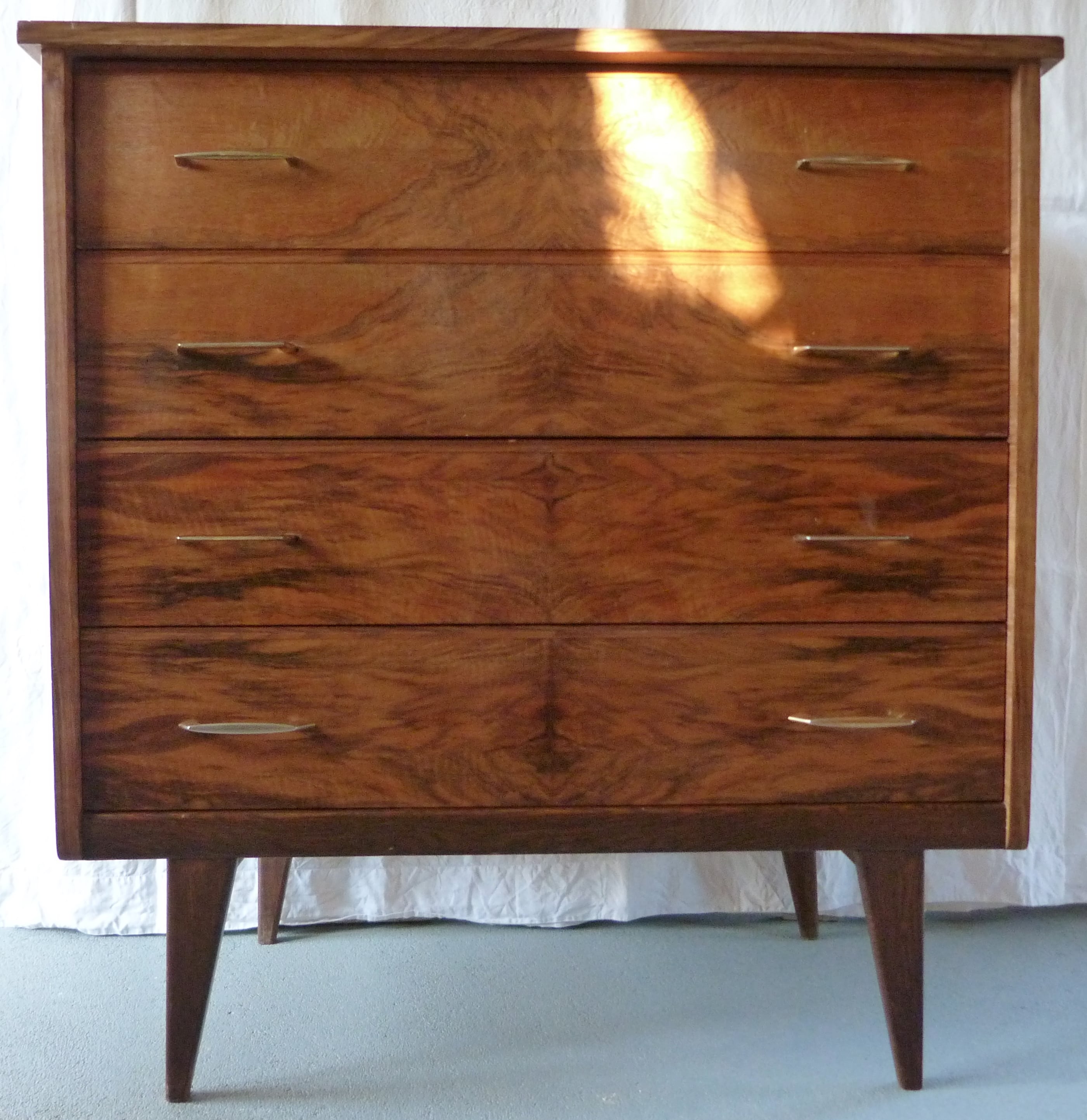 Compass feet chest of drawers