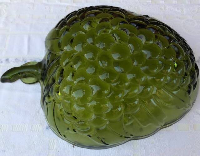 Fruit basket with bunch of grapes