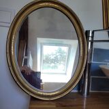 Oval mirror in gilded stucco 45 cm