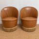 Vintage cognac fringe tub chairs