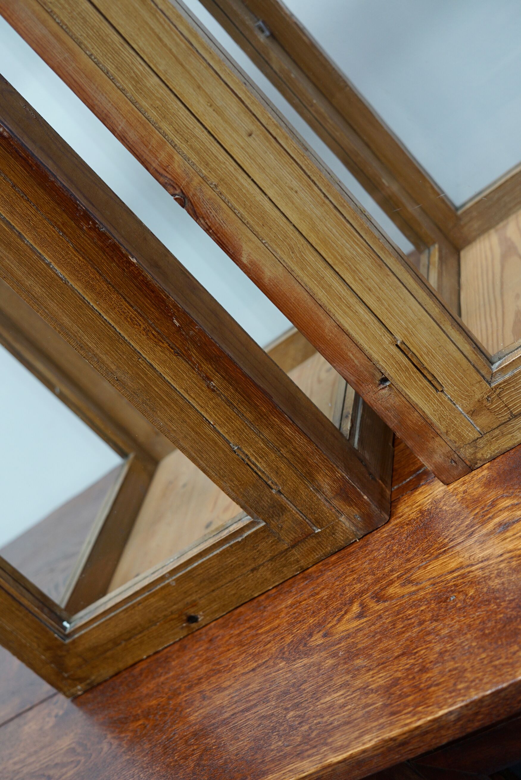 pair of faux oak shop display cabinets, circa 1920s