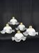 Set of 5 scalloped white opaline flower pendants, braided black cable.