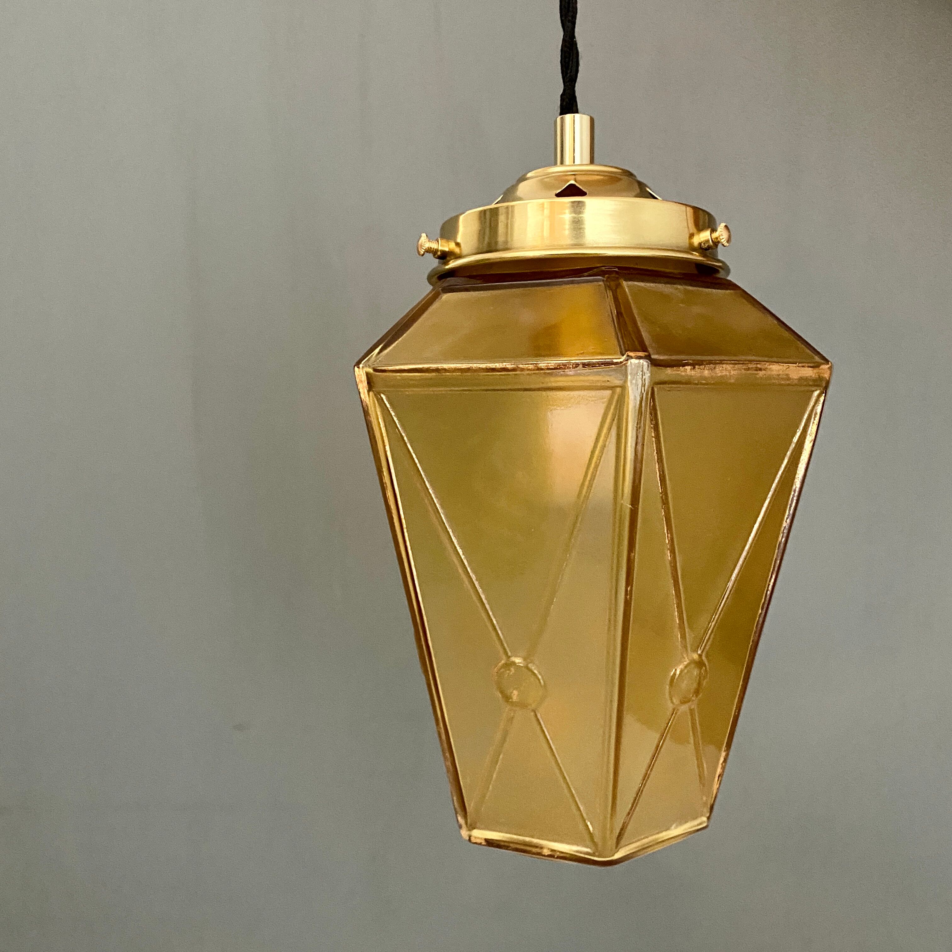 Suspension globe vintage art deco in yellow and gold glass