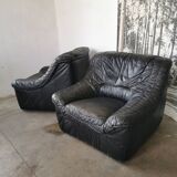 Pair of black leather armchairs from the 80s