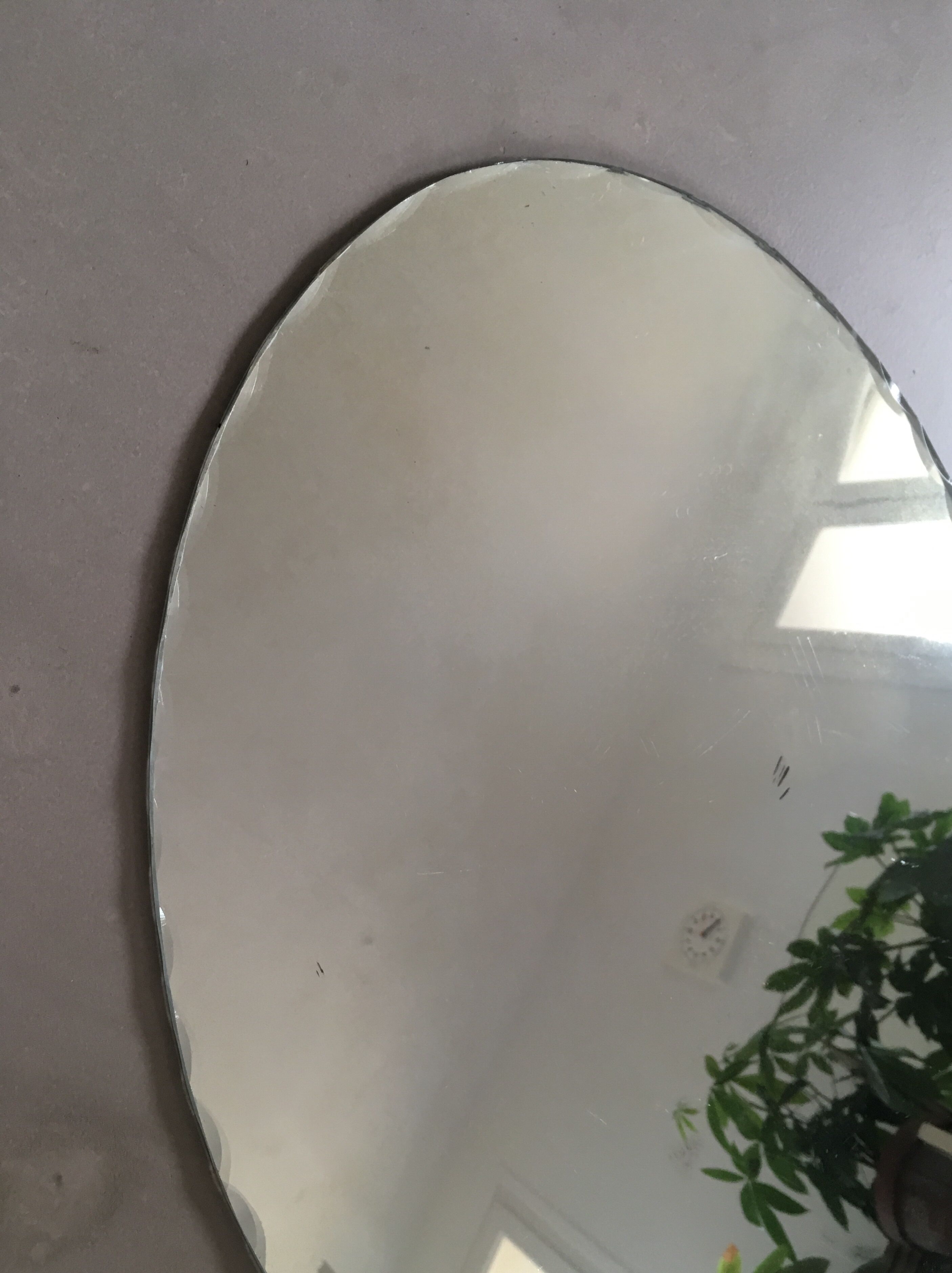 Ancient chiseled oval mirror 44x60cm
