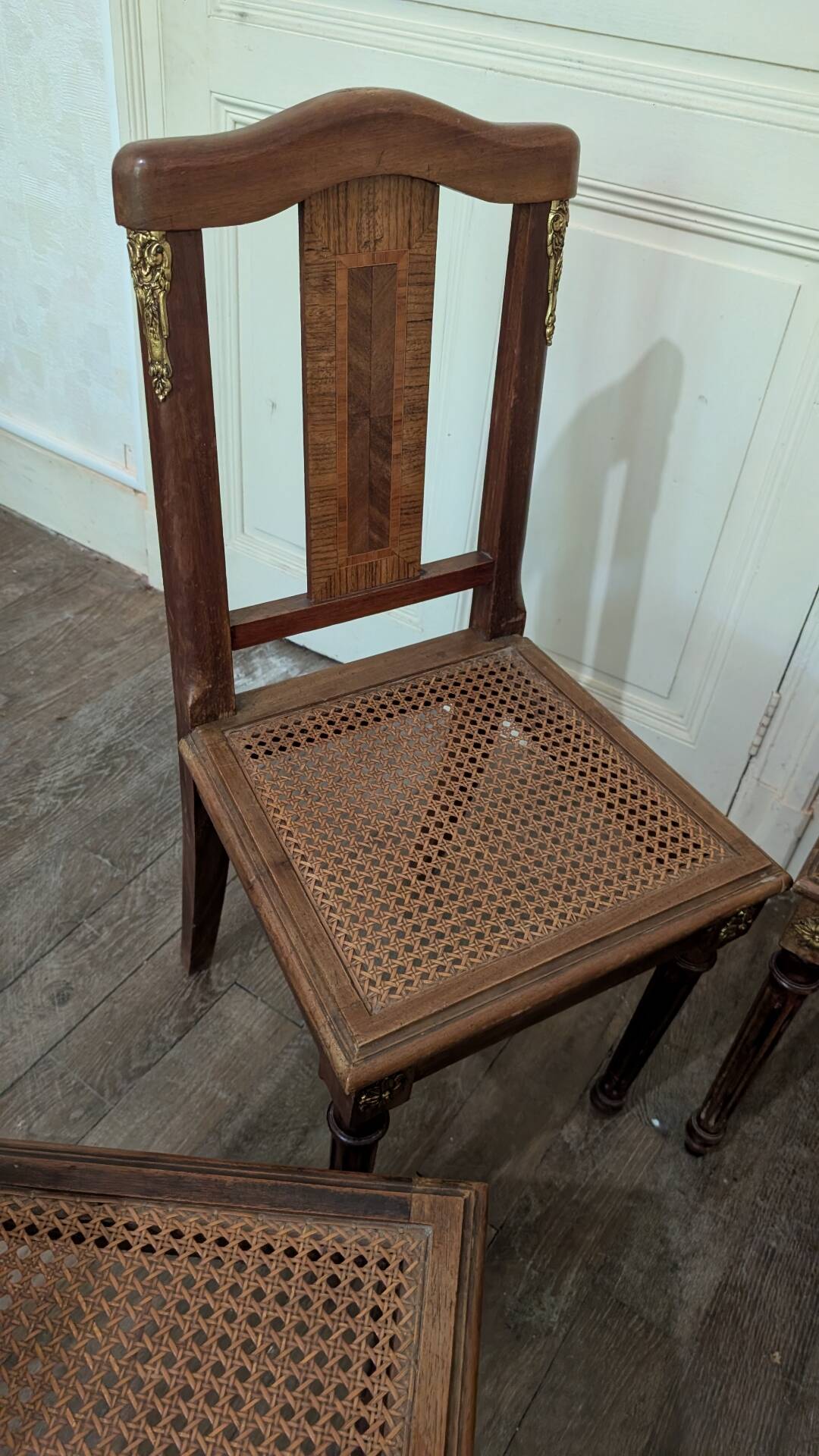 Set of 6 Louis XVI chairs in marquetry wood and caning.