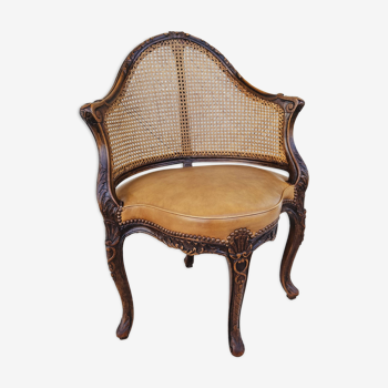 Fauteuil de bureau louis xv, sculpté, canné, garni cuir