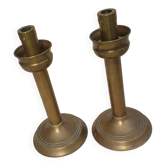 Pair of old brass candlesticks