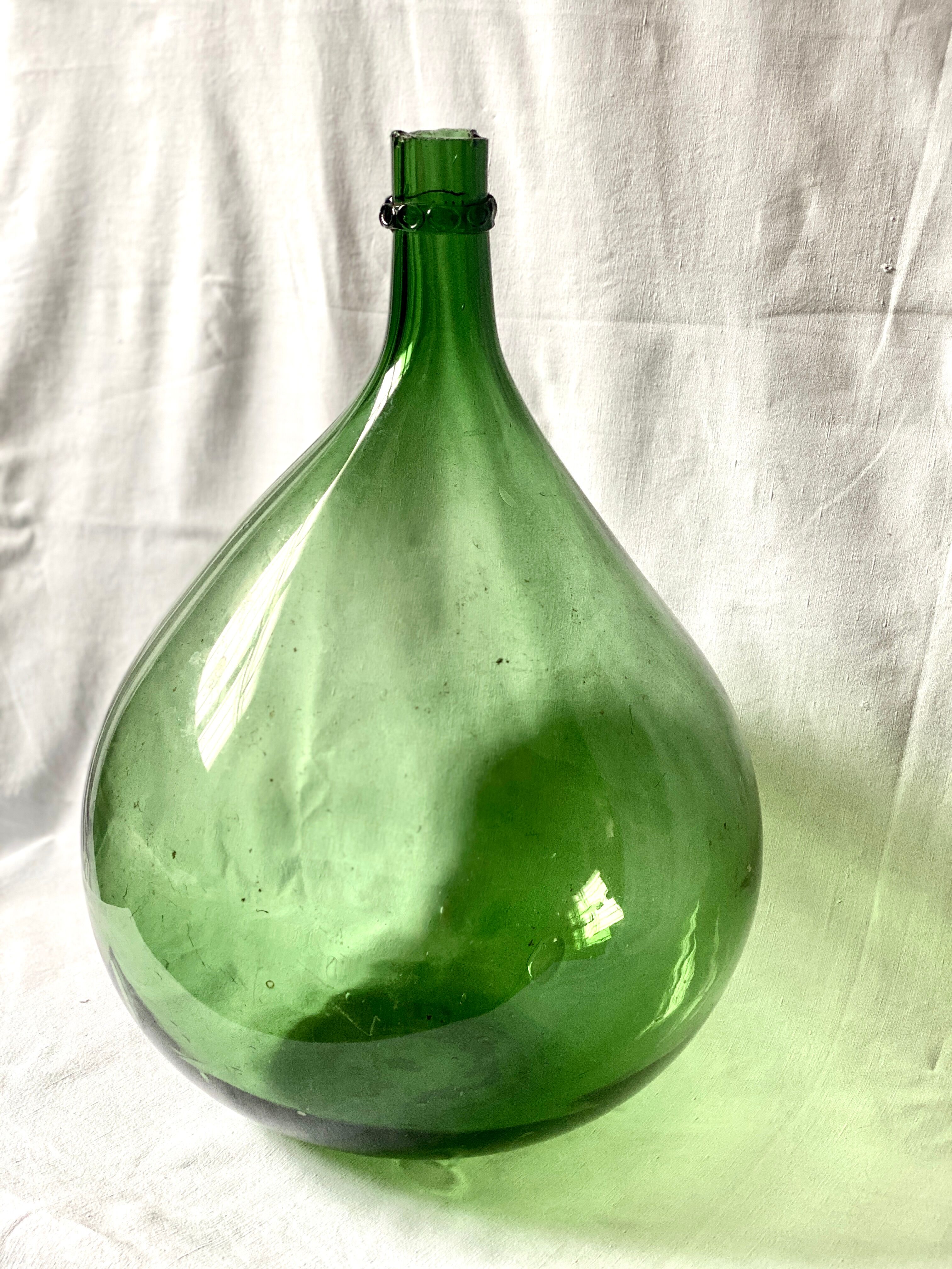 Old Lady Joan in green glass
