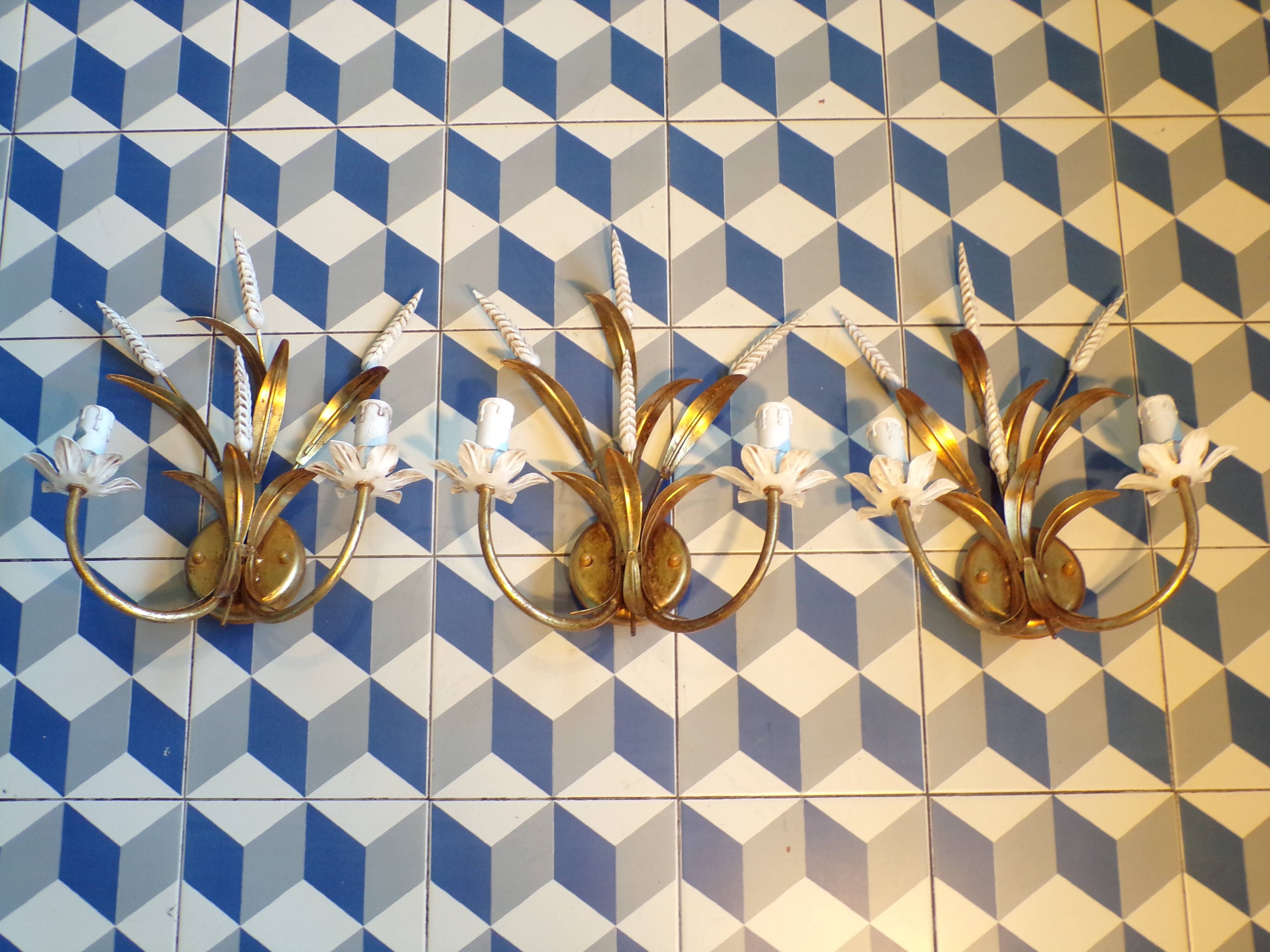 Trio of golden iron wheat ear wall lights