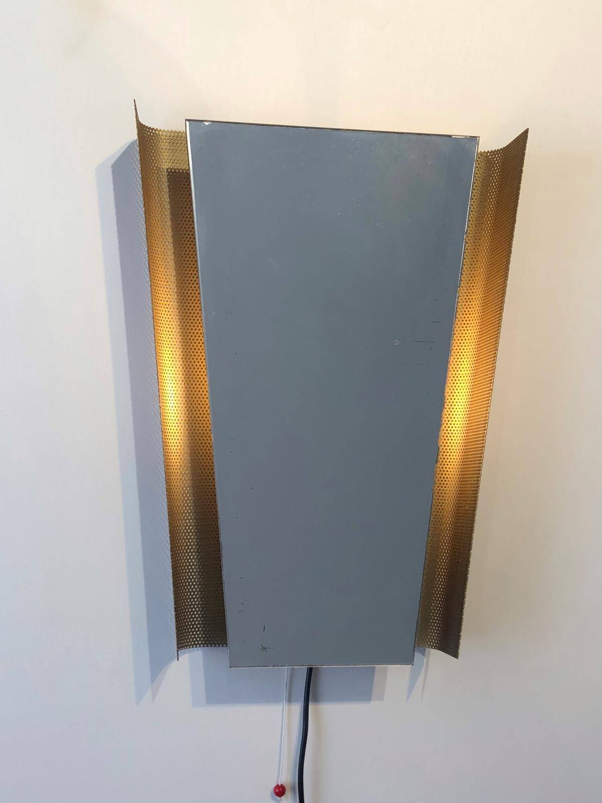 Backlit wall mirror by Floris H. Fidelij