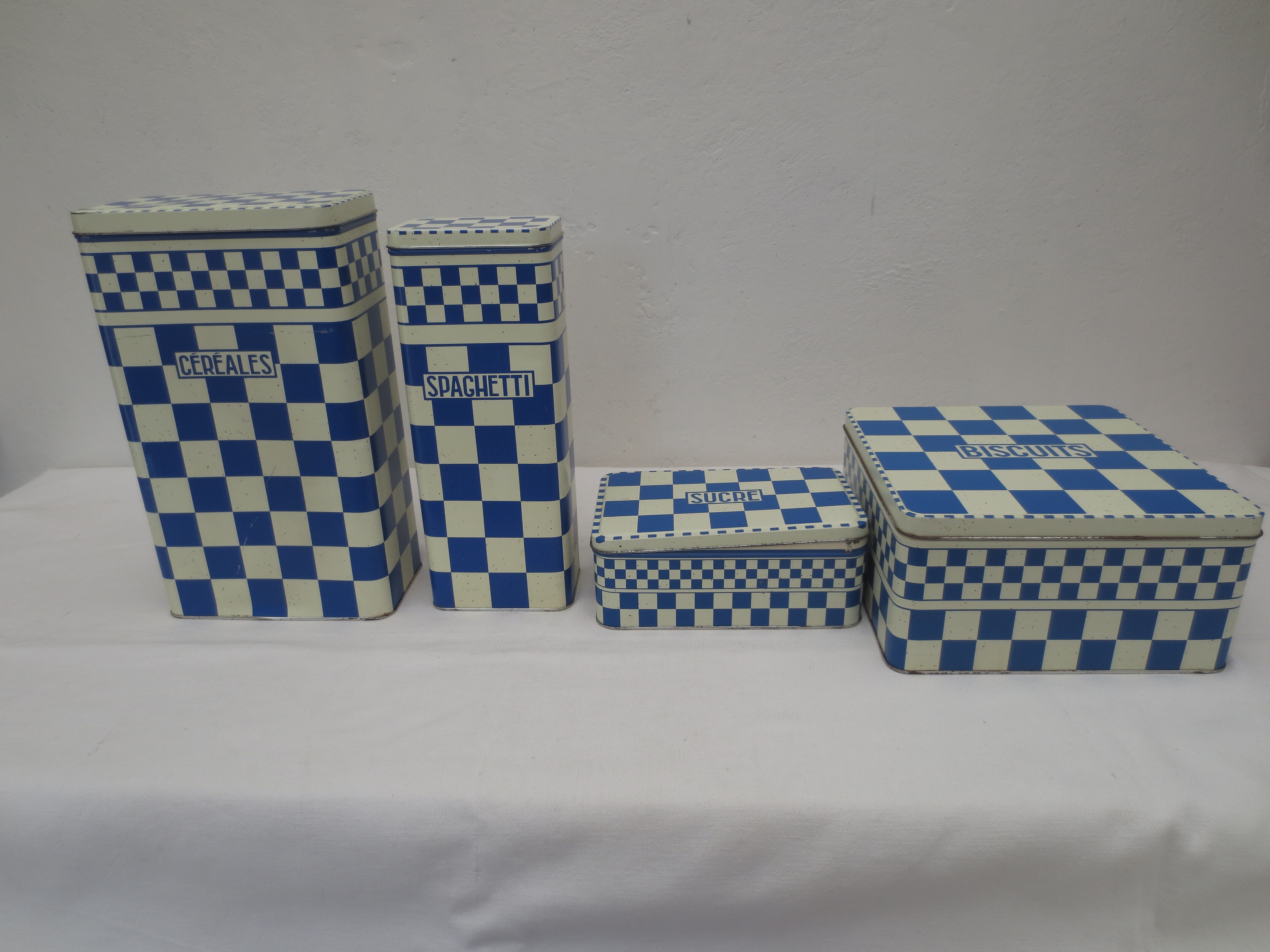 Series of 4 metal boxes, blue and white lustucru decoration
