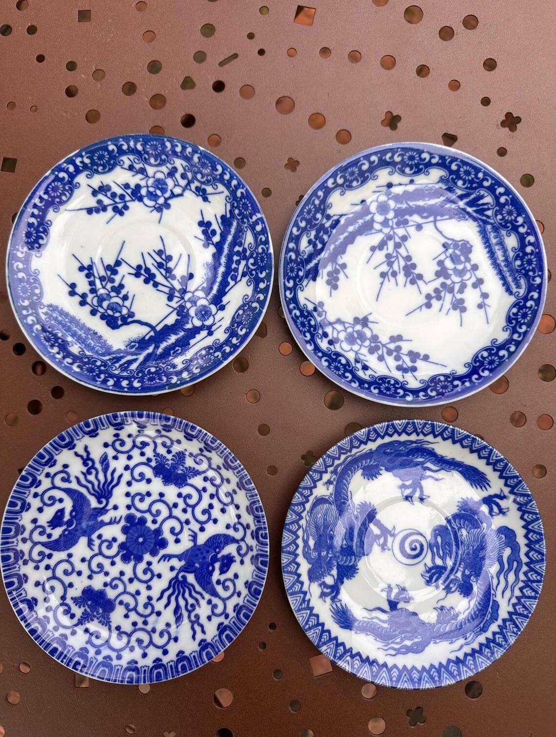 Small vintage plates made in Japan in blue and white porcelain.