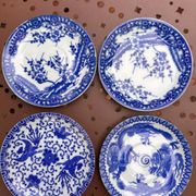 Small vintage plates made in Japan in blue and white porcelain.