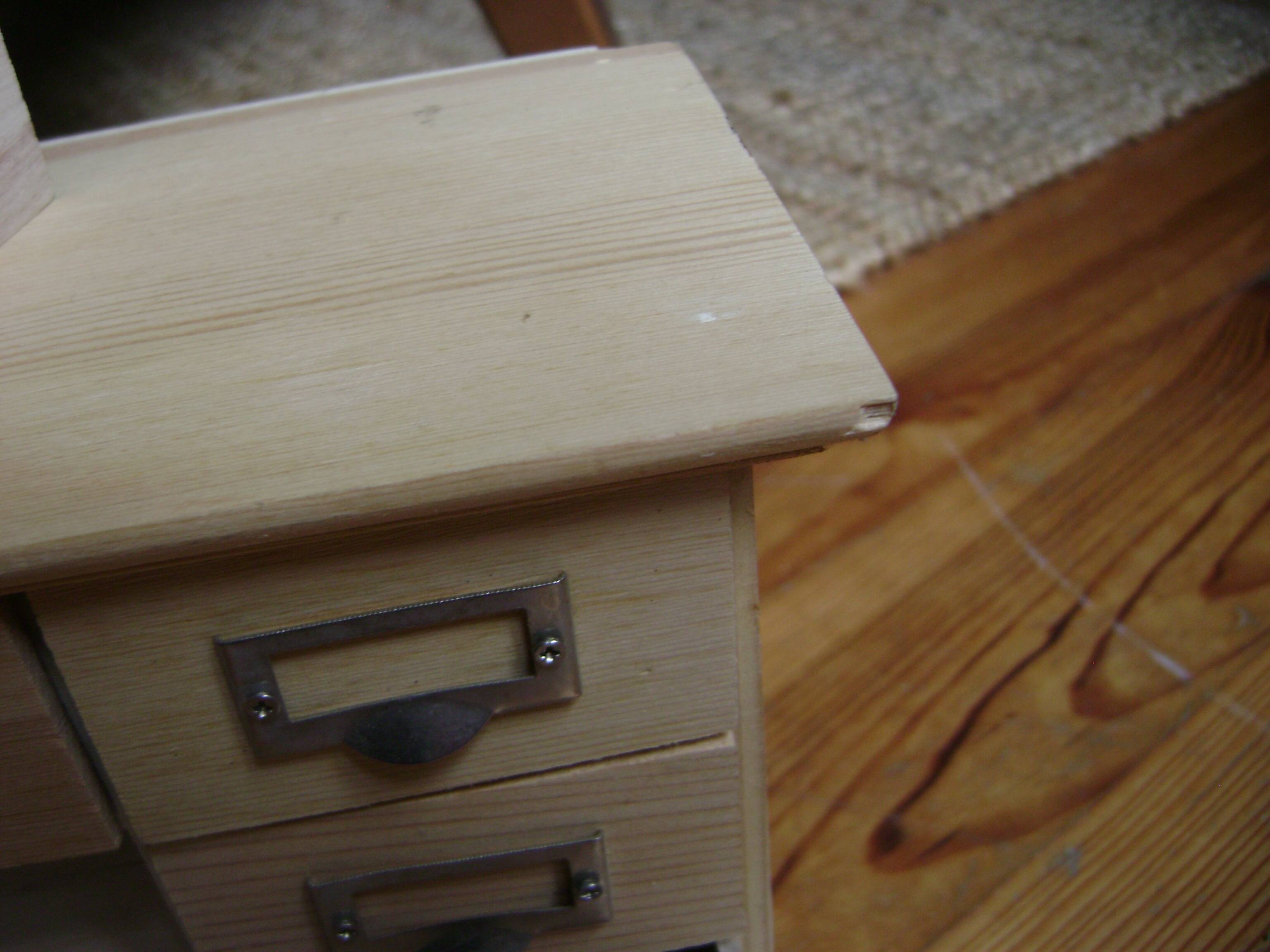 small wooden drawer unit
