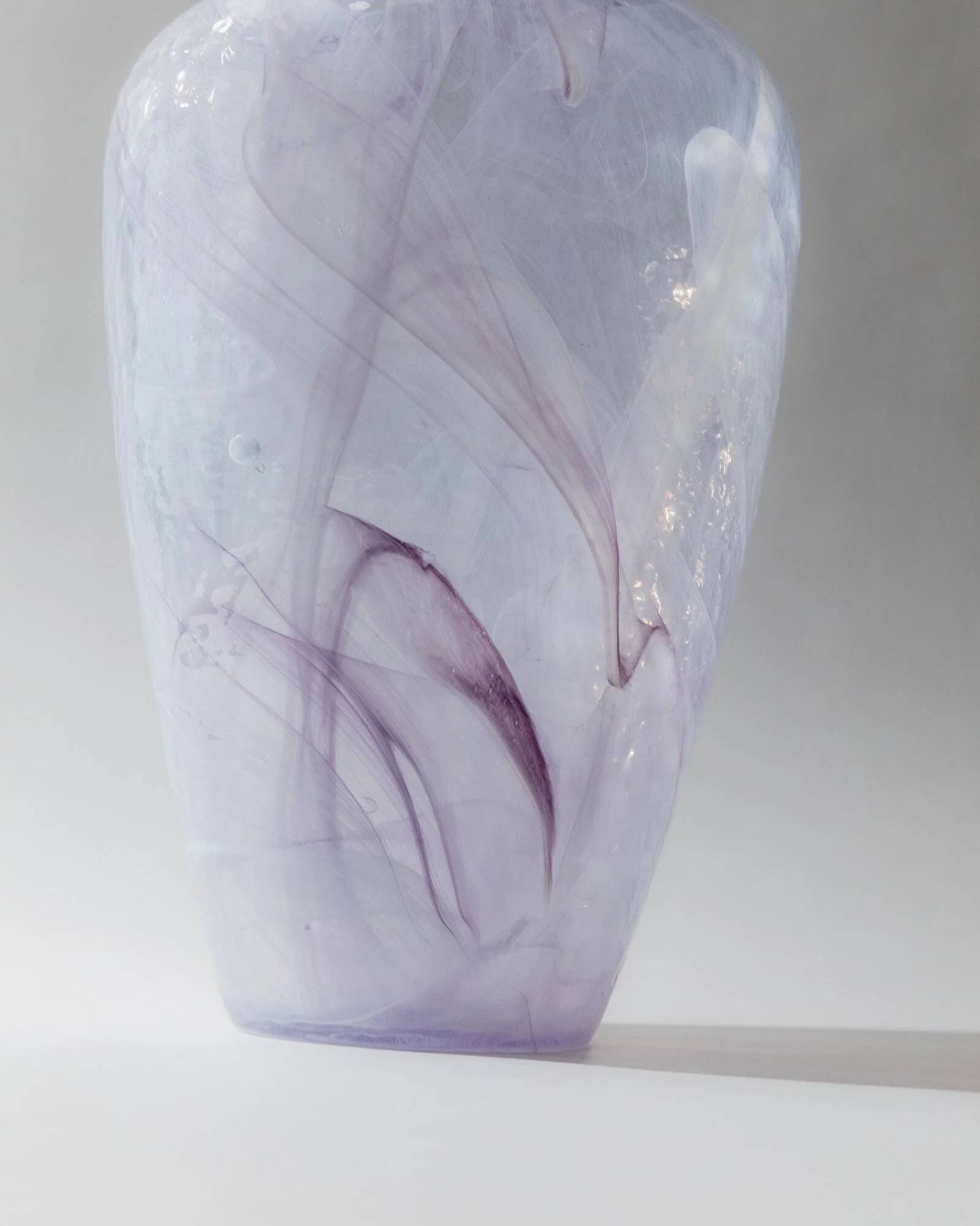 Vintage Murano glass vase from the 1970s, lilac and white swirl.