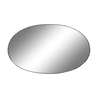 Bevelled oval mirror to lay 42 by 30cm